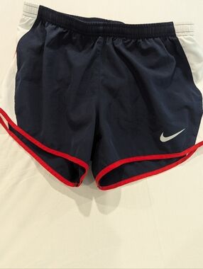 Nike Women's Navy Blue Athletic Shorts with White Panels and Red Trim